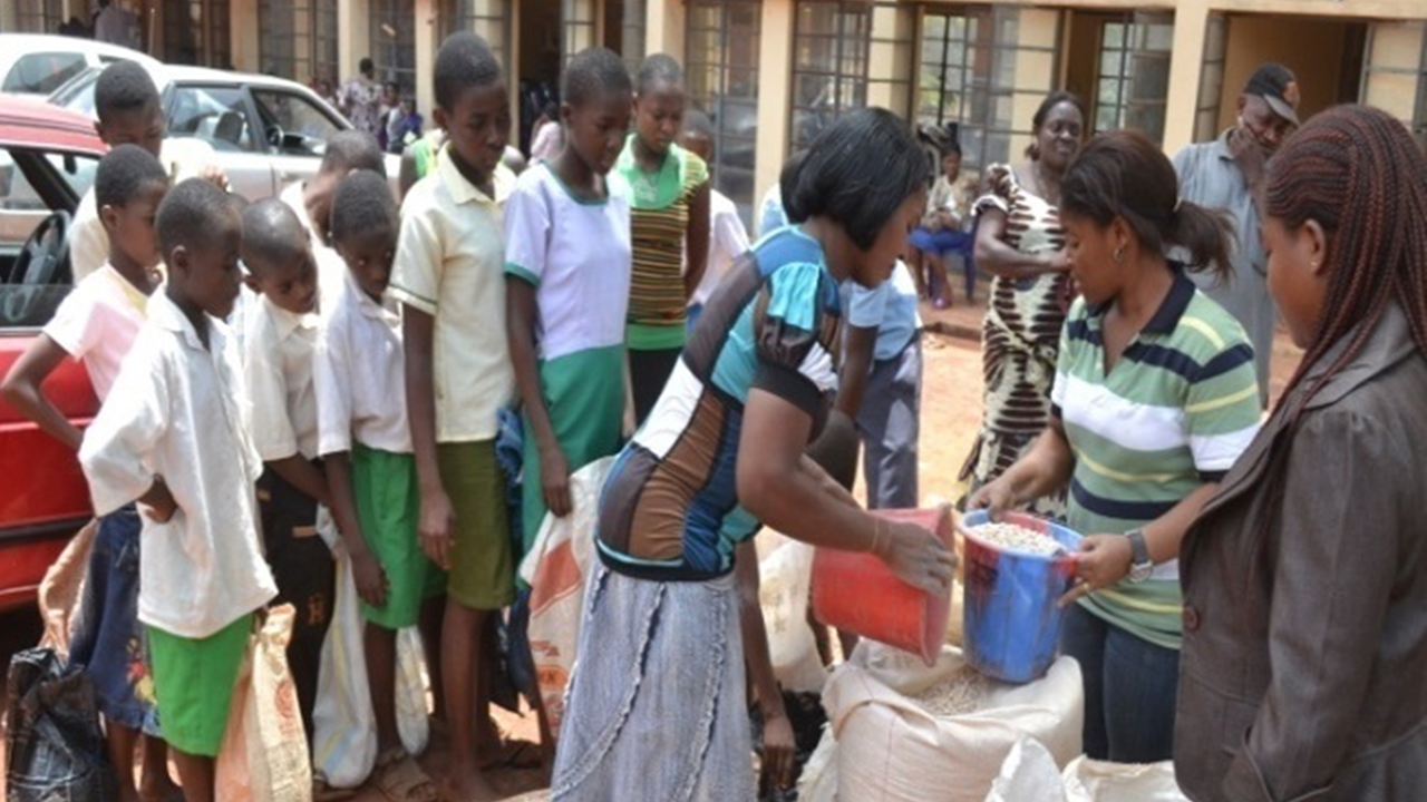 One of the caregivers Mrs. Lovelyn Eke helping ACERDEN team to disburse the food items to the OVCs